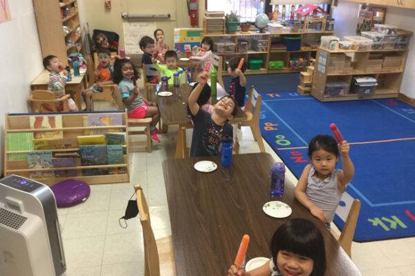 Socializing at snack time with the Little Dolphins at 76th Street!