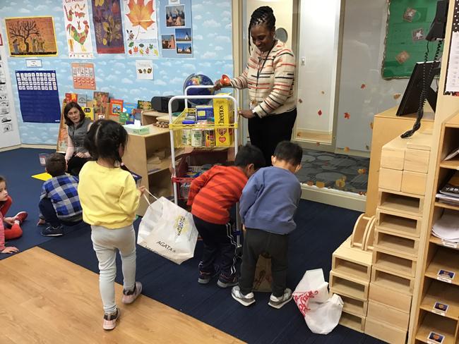 Monique visits the Junior Kindergarten classroom to collect donations for City Harvest NYC.