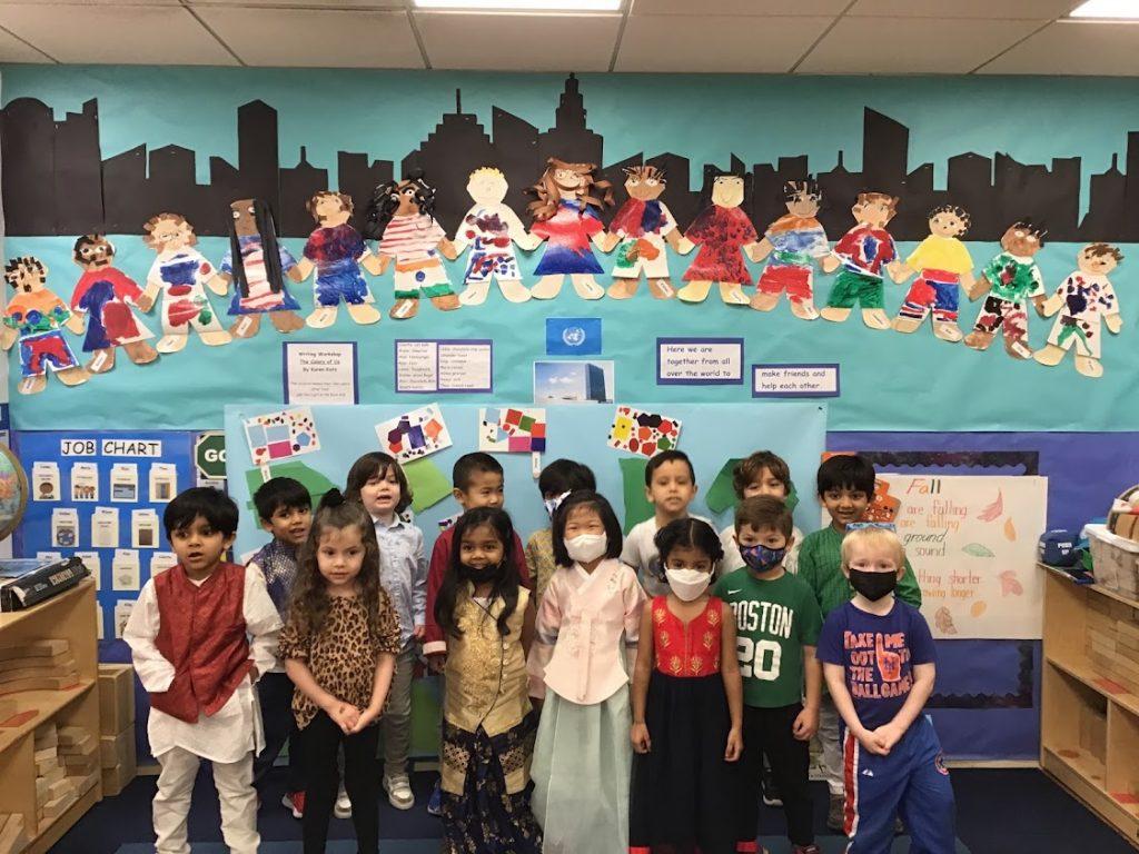 The Pre-K class poses for a group photo before our United Nations (UN) Day