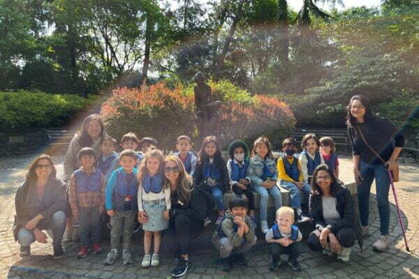 The Pre-K children pose with some of the parents on their trip to release their butterflies!