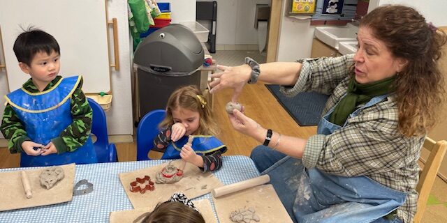Ms. Deb demo making pinch pot.(rm1)jpg